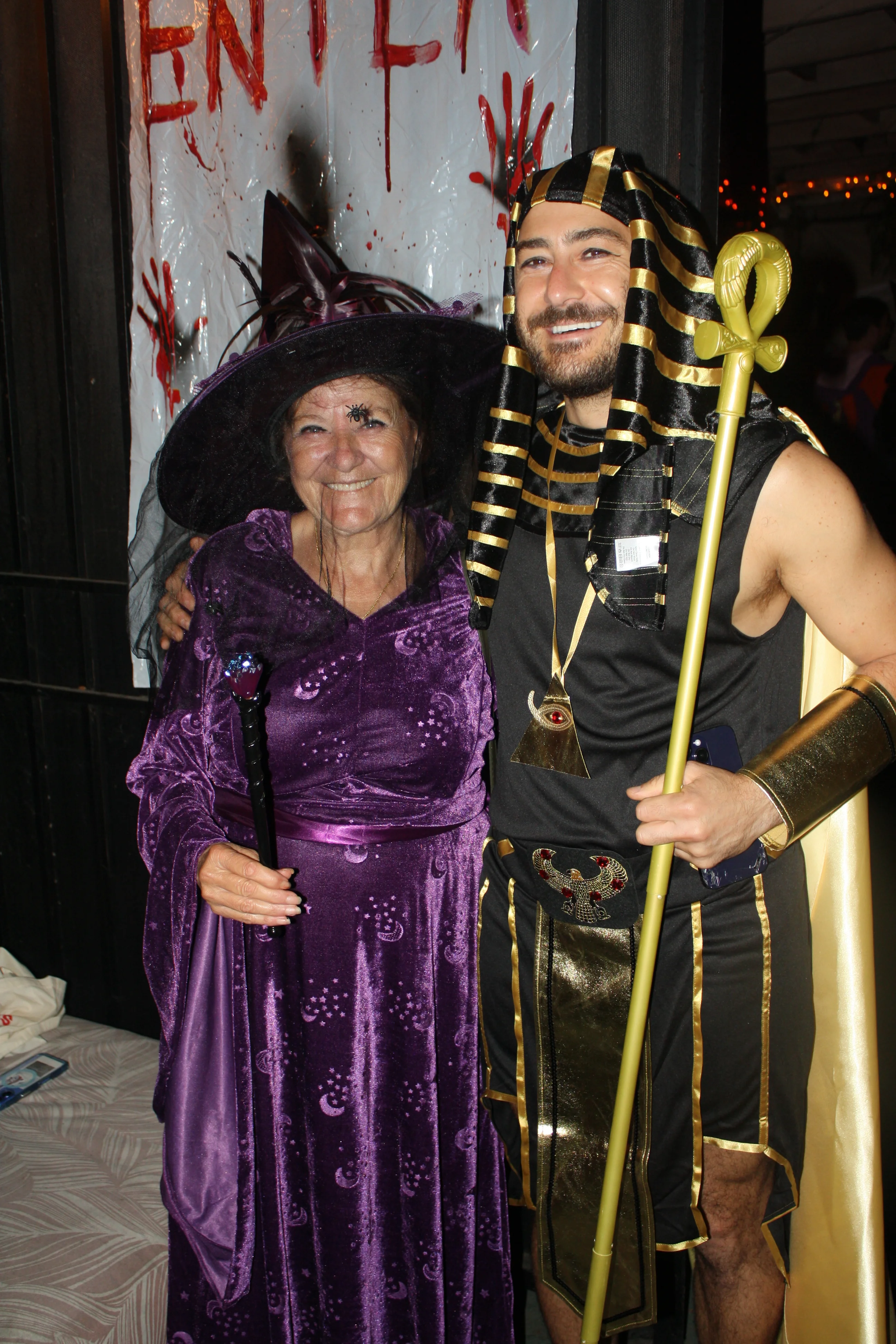 Friends dressed as a pharaoh and a purple witch